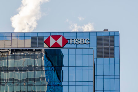 Edmonton, Alberta, Canada. Apr 3, 2023. A HSBC sign on top of a building. A British multinational universal bank and financial services holding company.のeditorial素材