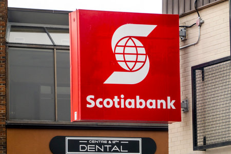 Calgary, Alberta, Canada. Apr 04, 2023. A Scotiabank neon sign. Canadian multinational banking and financial services company.のeditorial素材