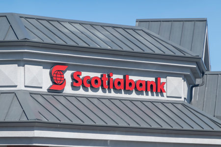 Calgary, Alberta, Canada. Apr 07, 2023. An Scotiabank sign at location branch building.のeditorial素材