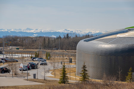 Calgary, Alberta, Canada. Apr 14, 2023. Surge Sport Medicine, with the Rocky Mountains on the background.のeditorial素材