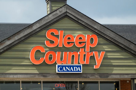 Calgary, Alberta, Canada. May 9, 2023. A Sleep Country Canada entrance sign store.のeditorial素材