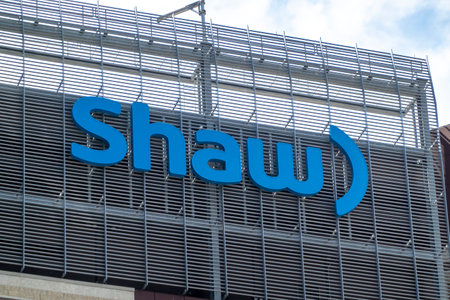 Calgary, Alberta, Canada. Jun 4, 2023. A close up to a Shaw building sign during spring.のeditorial素材