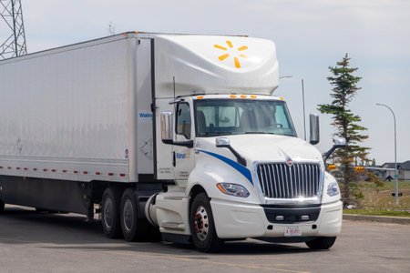 Calgary, Alberta, Canada. Jun 6, 2023. A white Walmart semi cargo truck trailer.のeditorial素材