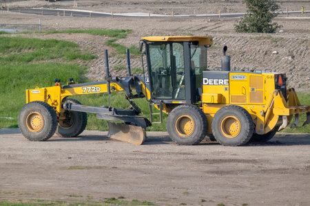 Calgary, Alberta, Canada. July 30, 2023. A Deere 772D Motor Graderのeditorial素材