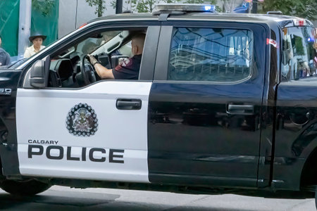 Calgary, Alberta, Canada. Aug 4, 2023. A close up to a Calgary police vehicle pickup truck during summer.のeditorial素材