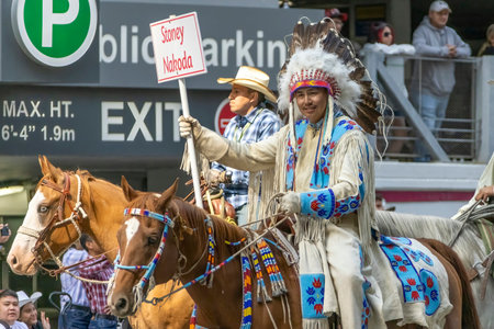 Calgary, Alberta, Canada. July 7, 2023. The Stoney Nakoda the original peoples of the mountains also known in Nakoda language as the Iyarhe Nakoda and previously as the Iyethkabi at a public event.のeditorial素材