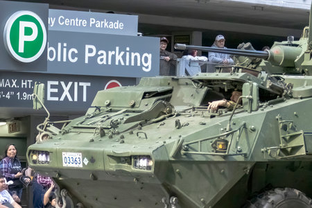 Calgary, Alberta, Canada. July 7, 2023. A close up to a Canadian Armed Force armoured main battle tank with a soldier in at a public festival parade.のeditorial素材