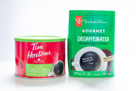 Calgary, Alberta, Canada. Aug 1, 2023. A President's Choice GOURMET a nd a Tim Hortons Swiss water process decaf coffee packages.のeditorial素材