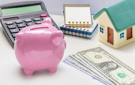 Savings and real estate concept. Home financing. Mortgage payments homeowners options.の写真素材
