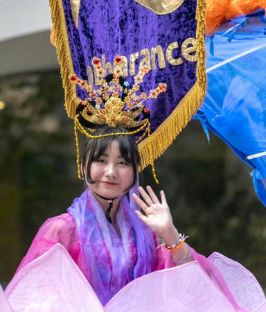 Calgary, Alberta, Canada. July 7, 2023. An Asian woman wearing a traditional Thai cloths at a public parade.のeditorial素材