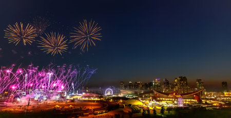 Calgary, Alberta, Canada. July 8, 2023 Downtown Calgary skyline city with some fireworks during summer.のeditorial素材