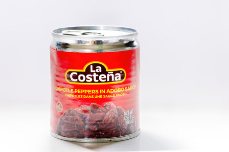 Calgary, Alberta, Canada. Aug 9,2023. La Costena brand, Chipotle peppers in adobe sauce can. Mexican food ingredients.のeditorial素材