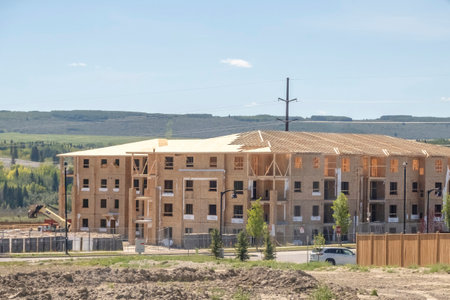 Cochrane, AB, Canada. Aug 13 ,2023. A new condominium building structor under construction. Concept: Canada Housing Crisisのeditorial素材