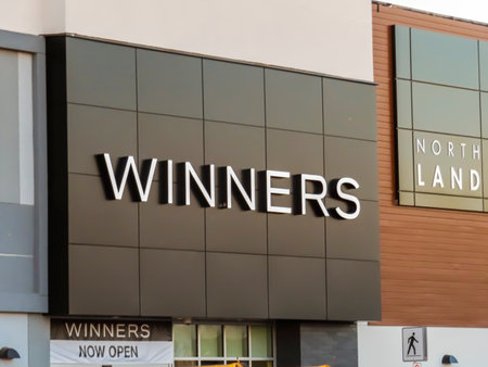 Calgary , Alberta, Canada. Oct 8, 2023. A Winners store sign, a chain of off-price Canadian department storesのeditorial素材