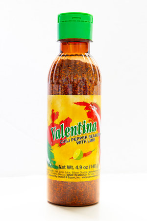 Calgary, Alberta, Canada. Sep `15, 2023. A plastic bottle with Valentina brand of Chili pepper seasoning with lime.のeditorial素材