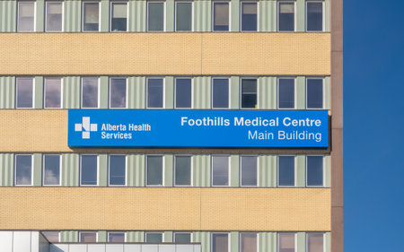 Calgary, Alberta, Canada. Feb 15, 2024. A sign with the text: Alberta Health Services Foothills Medical Centre Main Building. One of twelve hospitals in the Calgary zoneのeditorial素材