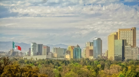 Mexico City, Mexico. Jan 11, 2024. Mexico City Downtown skyline with a flag during winter.のeditorial素材