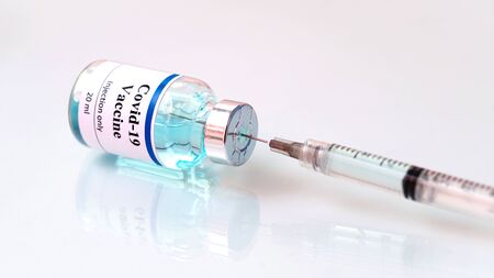 Vaccine concept close up of vaccination vial with syringe,Vaccine and syringe injection,coronavirus disease 2019,COVID-19,nCoV 2019 from Wuhan.の写真素材