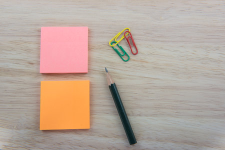 Color  Paper notes with sticky note on Wood Backgroundの写真素材