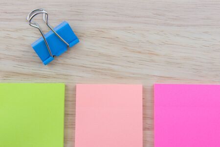 Color  Paper notes with sticky note on Wood Backgroundの写真素材