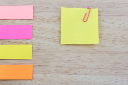 Color  Paper notes with sticky note on Wood Backgroundの写真素材