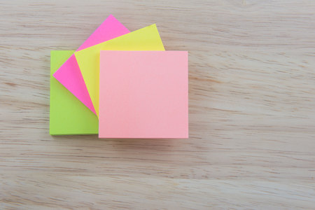 Color  Paper notes with sticky note on Wood Backgroundの写真素材