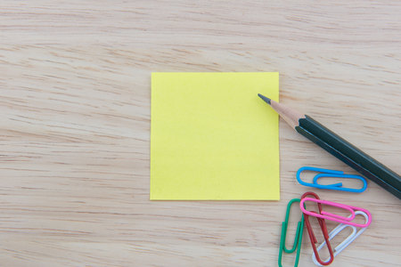 Color  Paper notes with sticky note on Wood Backgroundの写真素材