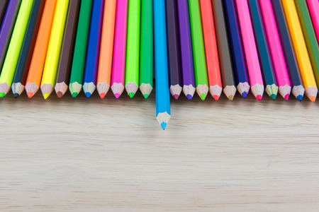 Colors pencils, colorful many crayons on wood backgroundの写真素材