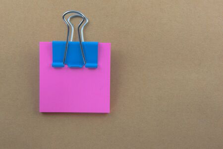 Color  Paper notes with sticky note on brown Backgroundの写真素材