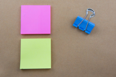 Color  Paper notes with sticky note on brown Backgroundの写真素材