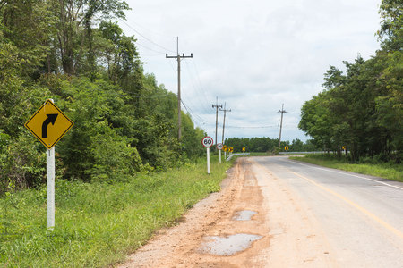 Country Road, Beware of the curve, Slow downの写真素材