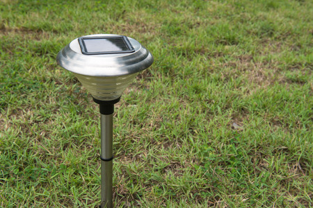 Solar Light in the grass. Clean energy is popular. For Earth, Superfundの写真素材