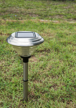 Solar Light in the grass. Clean energy is popular. For Earth, Superfundの写真素材