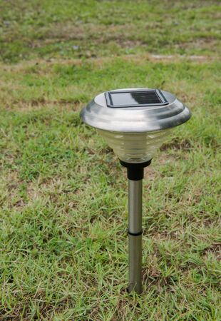 Solar Light in the grass. Clean energy is popular. For Earth, Superfundの写真素材
