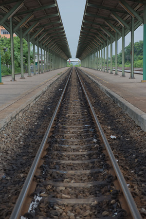 The old Railroad and the platform in the train stationの写真素材