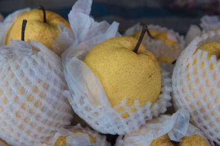 Fresh  pear fruit is much on the market  backgroundの写真素材