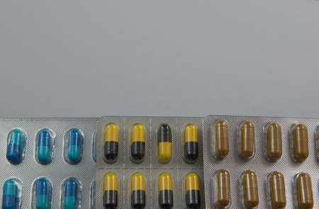colorful  capsule Panel drug on white  backgroundの写真素材