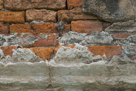 the Orange brick and  cement old wall. For wallpaper