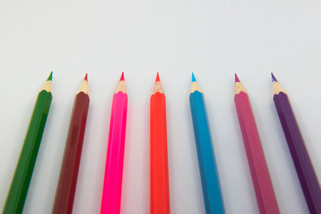 Colors pencils, colorful many crayons on white background.の写真素材
