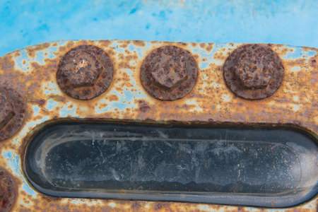 closeup Big rusty metal Screws and nuts locked with rustの写真素材