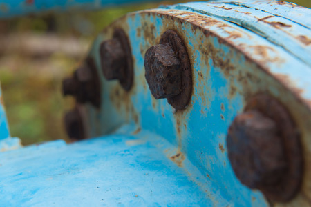 closeup Big rusty metal Screws and nuts locked with rustの写真素材