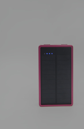 Pink color SolarCell power bank on white background