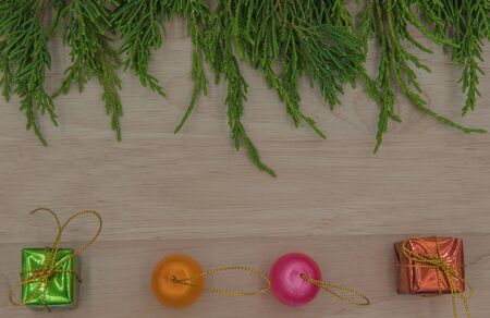 Christmas or New Year  pine and gift on wooden background.の写真素材