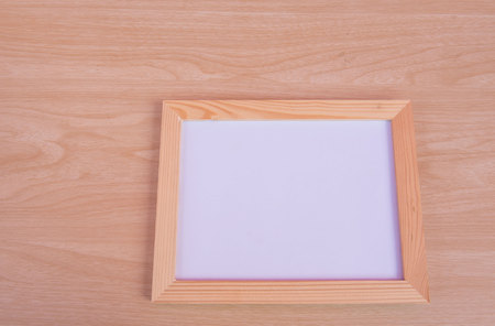 photo Frame on a wooden background .の写真素材