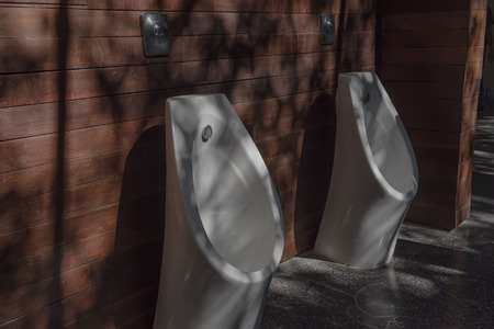 modern restroom with urinal row in the garden.の写真素材