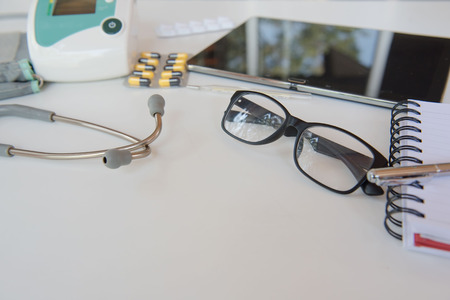 stethoscope and Medical equipment. Doctor workplace in office .の写真素材