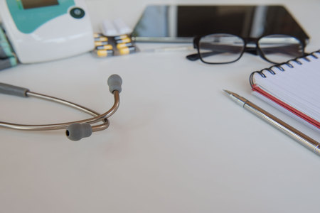 stethoscope and Medical equipment. Doctor workplace in office .の写真素材