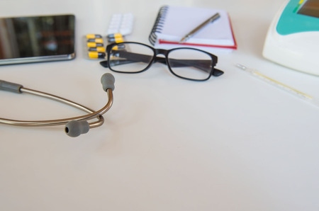 stethoscope and Medical equipment. Doctor workplace in office .の写真素材