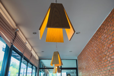 Wooden hanging lamp on the ceiling, background