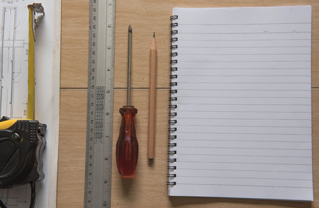 book  Measuring Tape and blueprints and Ruler . Architectural and engineering housing concept.の写真素材